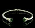 8033BG-GA	18K Gold & sterling silver green amethyst bangle 

