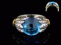 8033R-BT	18K Gold & sterling silver blue topaz ring

